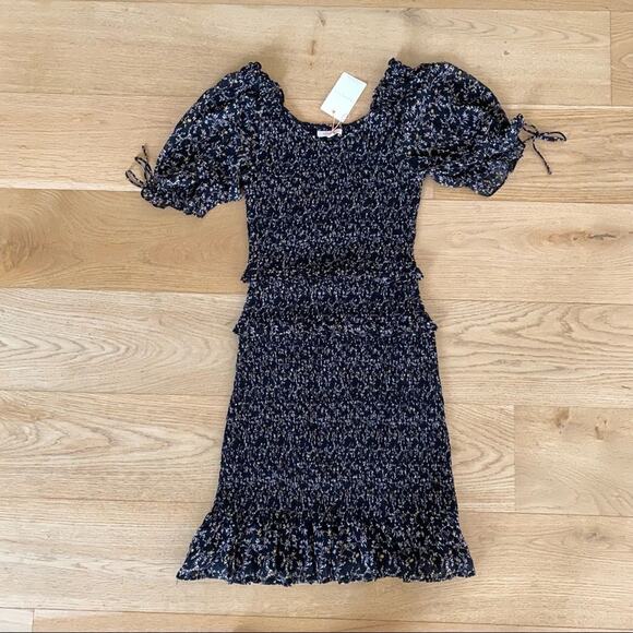 Skies Are Blue Ditsy Floral Smocked Mini Dress in Black - Picture 1 of 11